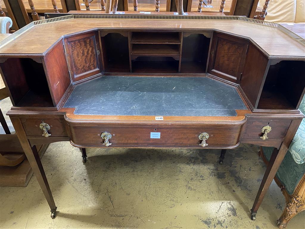 A late 19th century George III style mahogany Carlton House desk, length 122cm, depth 58cm, height 102cm